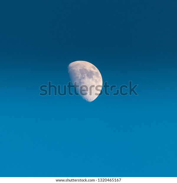 Rising Moon Blue\
Sky
