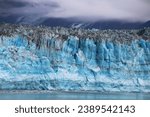 Rising out of the fog is Hubbard Glacier, a glacier in the state of Alaska and the Yukon Territory in Canada