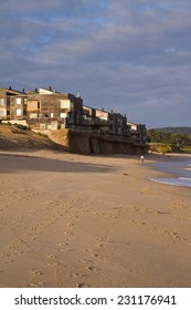 Rising Sea Level. Beachfront Condo Development Being Undermined By Rising Ocean Levels, Monterey Bay, California, USA