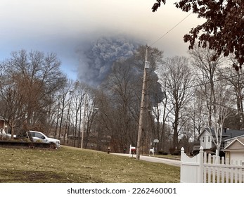The rising smoke cloud after authorities released chemicals from train derailment as seen from the ground in nearby neighborhood  Photo credit: RJ Bobin 