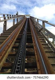 Rising To The Top Of A Wooden Rollercoaster From The Perspective Of The First Seat