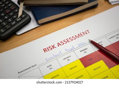 Risk Assessment Form Of Investment Project 2022 With A Luxury Ball Pen Which Is Placed On Paper. Business And Financial Object Photo. Close-up, Selective Focus.