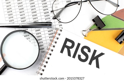 RISK - The Inscription Of Text On The Notepad, And Chart. Business