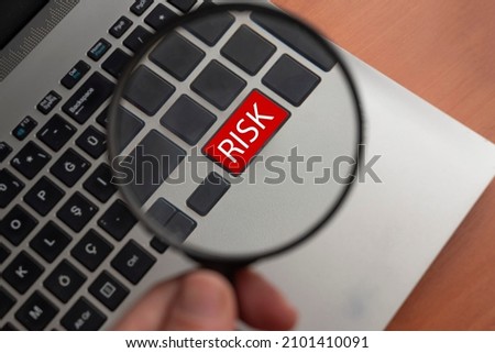 risk lettering on red key on computer keyboard.risk concept idea