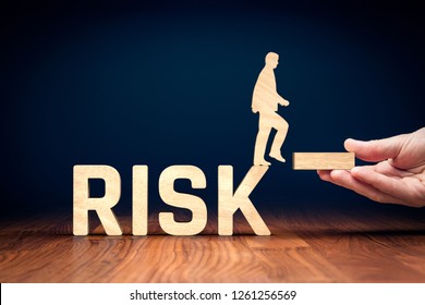 Risk management concept. Risk manager give stability for businessperson which can do step from risky business to stable. - Shutterstock ID 1261256569