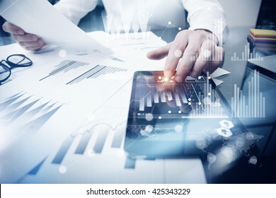 Risk Management Work Process.Photo Trader Working Market Report Documents Touching Screen Tablet.Using Graphic Icons,Stock Exchanges Reports. Business Project Startup. Horizontal, Flares Effect.