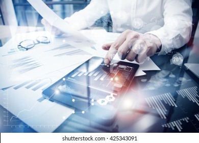 Risk Management Work process.Picture Trader working Market Report Document Touching Screen Tablet.Using Worldwide Graphic Icons,Stock Exchange Report.Business Project Startup.Horizontal,Flares Effect