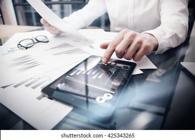 Risk Management Work process.Picture Trader working Market Report Documents Touching Screen Tablet.Using Graphic Icons,Stock Exchanges Reports. Business Project Startup. Horizontal, . - Shutterstock ID 425343265