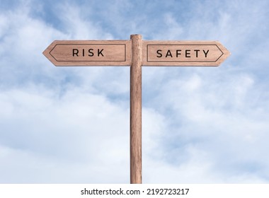 Risk or safety concept. Signpost with two messages on opposite way and sky background - Shutterstock ID 2192723217