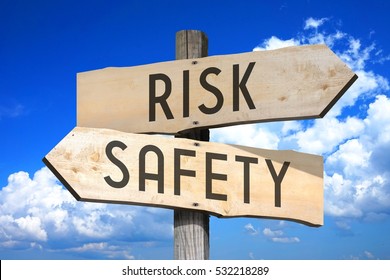 Risk, Safety - Wooden Signpost