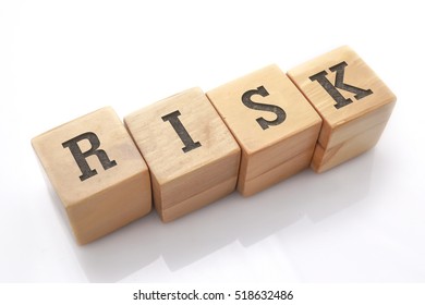 RISK Word Made With Building Blocks Isolated On White