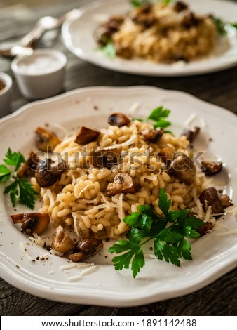 Similar – Image, Stock Photo a stone mushroom with his bright brown has stands on a clearing