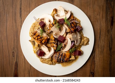 risotto with grilled duck, mushrooms, onion and beet cubes