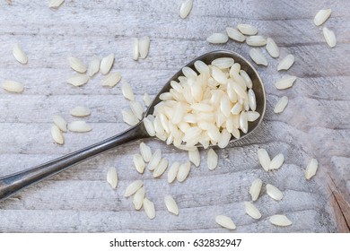 Risotto on a spoon macro.