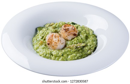 Risotto With Spinach And The Adductor Muscle Of Shellfish