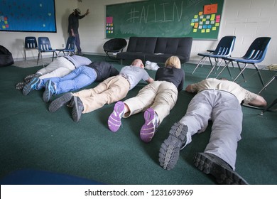 RITTMAN, OH - JUNE 20, 2014. School Employees Play Dead On The Floor During An Active Shooter Mock Scenario.