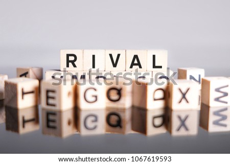 RIVAL word cube on reflection