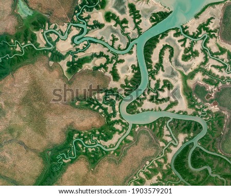 River with all its branches in the north of Australia. Satellite view. Nature and aerial view. Global warming and climate change. Element of this image is furnished by Nasa