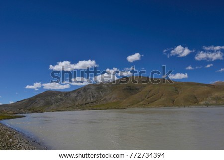 River along a mountain in Tibet, China