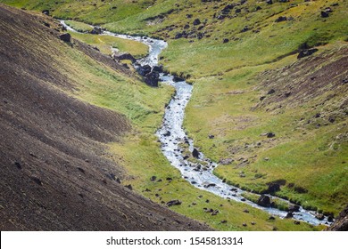 River along a V-shaped valley in Iceland