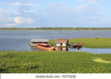 The River Amazon And Boats, Peru