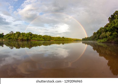 A River Of The Amazon With A Rainbow In Rupununi Guyana