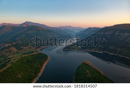 The river Arda valley in Rhodope mountains in Bulgaria during sunset. Meanders in the Lake Kardzhali or Kardjali.