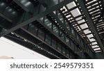 River Avenue under the train bridge at East 161 Street in the Bronx near Yankee Stadium, Bronx, New York City, USA.