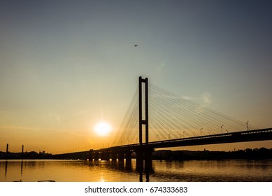 River and bridge.Most at sunset