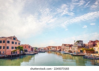 River canal in Venice Italy with colorful buildings in the summer - Shutterstock ID 2245073183