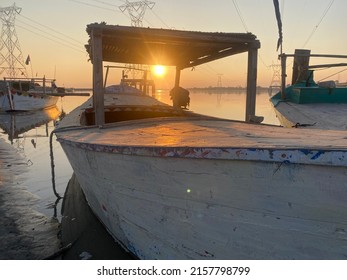 River Cargo Boats And Sunset View