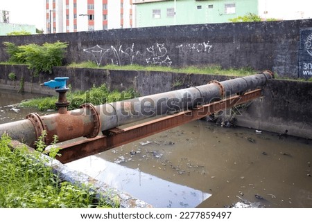 River channel in the city contaminated with domestic and industrial sewage.