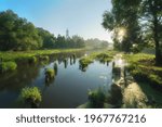 river and church at dawn