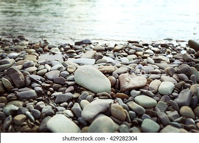 River Coast With Stones