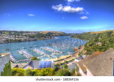 River Dart Dartmouth Devon with many boats and yachts in vivid brilliant colour HDR