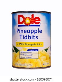 RIVER FALLS,WISCONSIN-MARCH 7, 2014: A Can Of Dole Pineapple Tidbits. Dole Food Company Is An American Agricultural Corporation Based In Westlake Village,California.