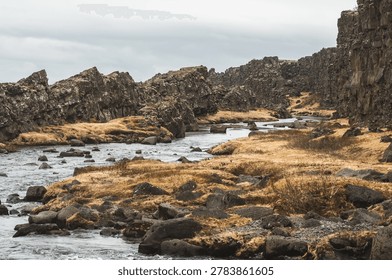 Öxará river flowing between massive tectonic plates in Thingvellir National Park in southwestern Iceland, Europe
