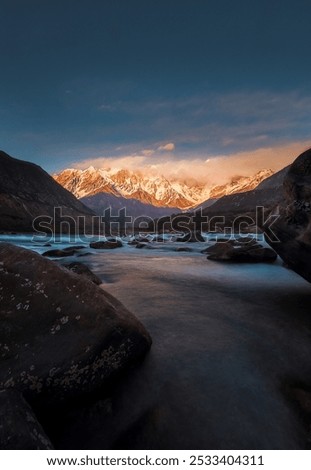 Similar – Image, Stock Photo River between rocks against blue sky