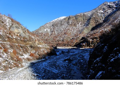 River flowing between two mountains. Beautiful river in forest nature. Big river in in the mountains. Wild nature of Caucasus. Mountain valley