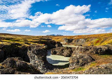 A river flowing in a rocky area on a sunny morning - Powered by Shutterstock