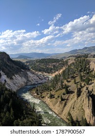 river flowing through the mountains