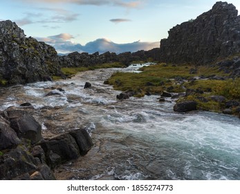 River flowing through rocky landscape, Thingvellir National Park, Blaskogabyggo, Southern Region, Iceland - Powered by Shutterstock