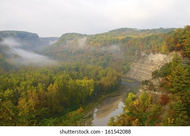 River Flows Between The Banks Of A Beautiful Autumn Park In Upstate New York