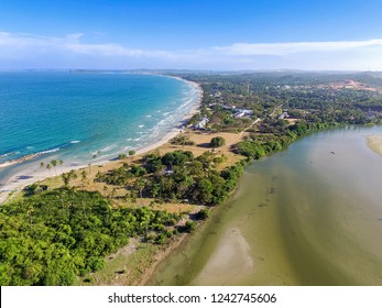 River flows into Back Bay of Indian Ocean near Nilaveli beach in Trincomalee, Sri Lanka.  Trincomalee is coastal resort city. Panoramic Top View on beach in Trincomalee.