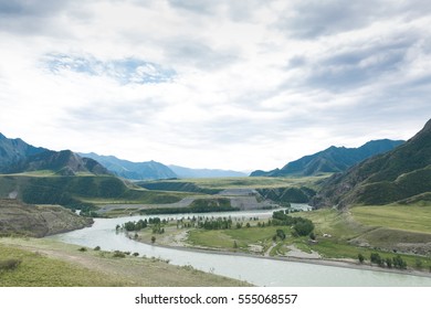 The river flows through mountain valleys