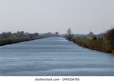 River Great Ouse in Littleport. Cambridge and Oxford boat race. Taken on the winning line with Ely in the distance.