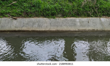 River Irrigation Channel With Cement Drain