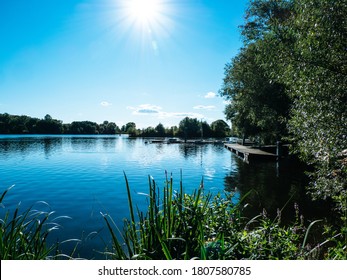 River Landscape On A Sunny Summer Day, Dove Elbe In Hamburg, Germany