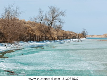 river last ice. Last ice-floe. last needle ice on the Ili River. Central Asia, the steppes of Kazakhstan