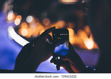 River Of Life, Kuala Lumpur, Malaysia - Sept 24, 2017 : A Visitor Capturing Photo Of The River On Instagram Story On An Apple IPhone (Visible Noise Due To High Iso, Soft Focus, And Slight Motion Blur)